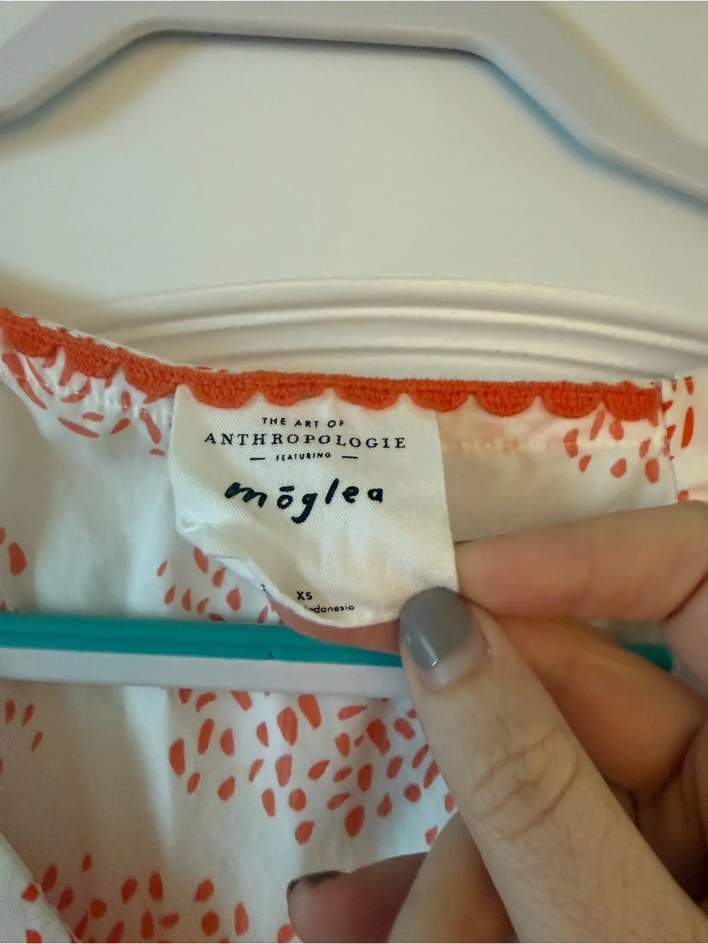 Anthropologie Cream Peasant Top with Orange Print